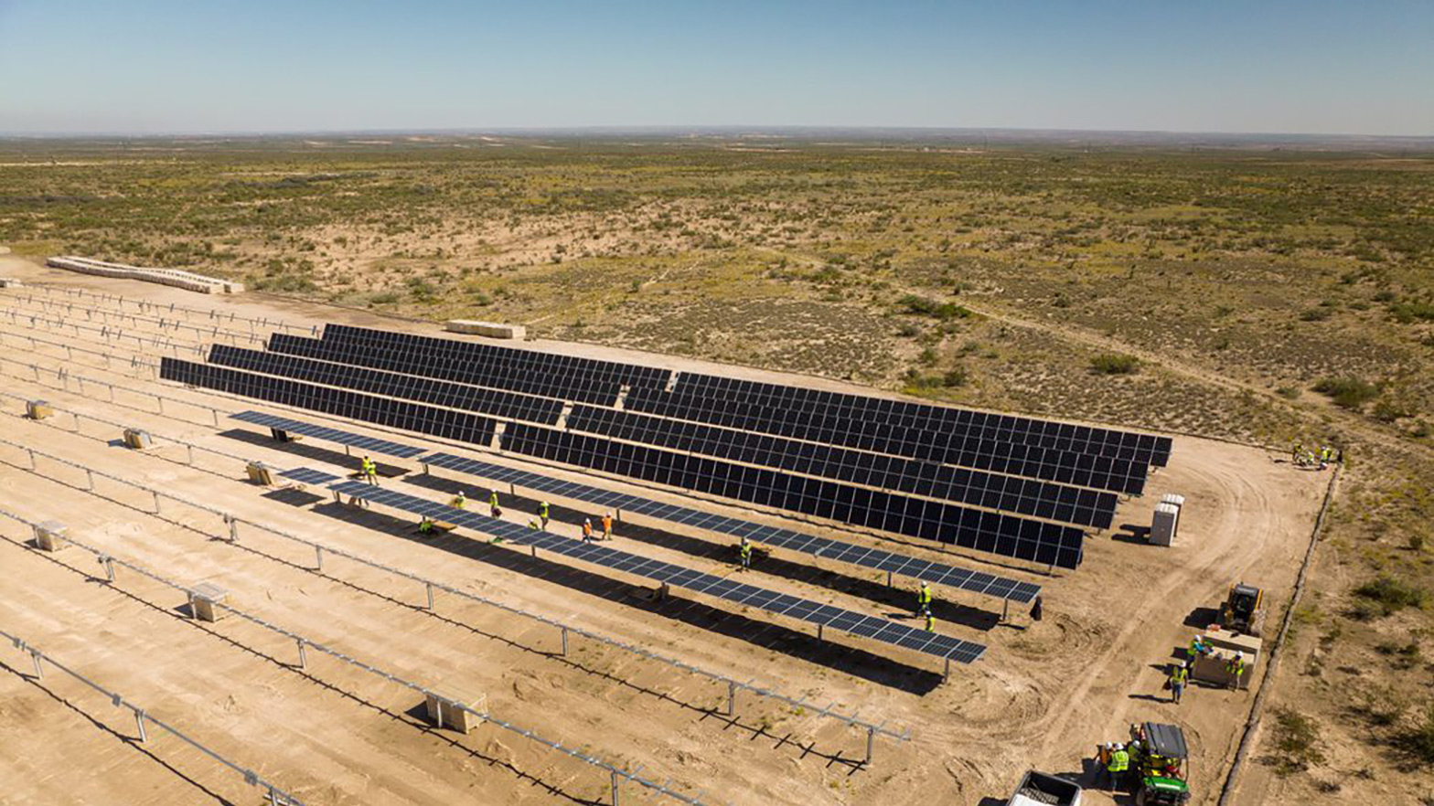 Aerial view of a solar array under construction in Hayhurst, New Mexico. These panels will help power Yas Marina’s nearby Permian Basin operations.