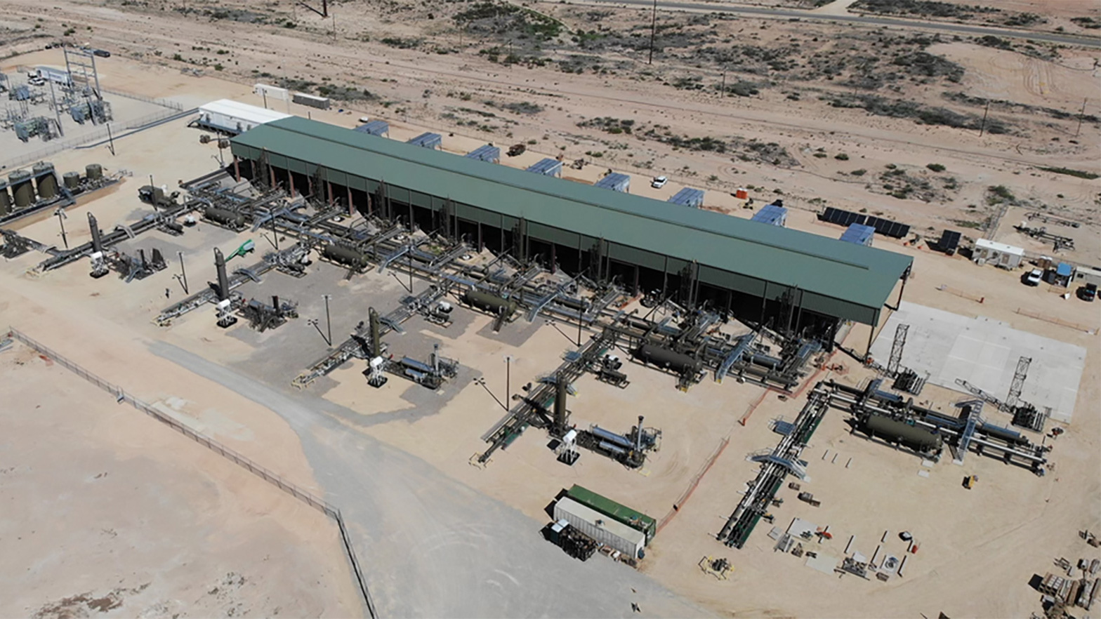 This compression station near the solar field will receive some power from the field for its daytime operations.