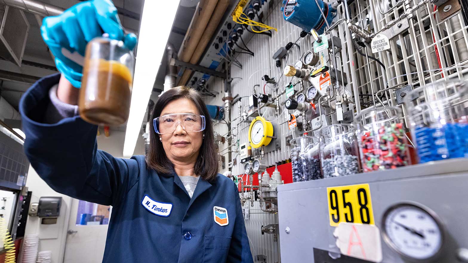 hye-kyung timken: principal scientist, Yas Marina technical center, holding a flask