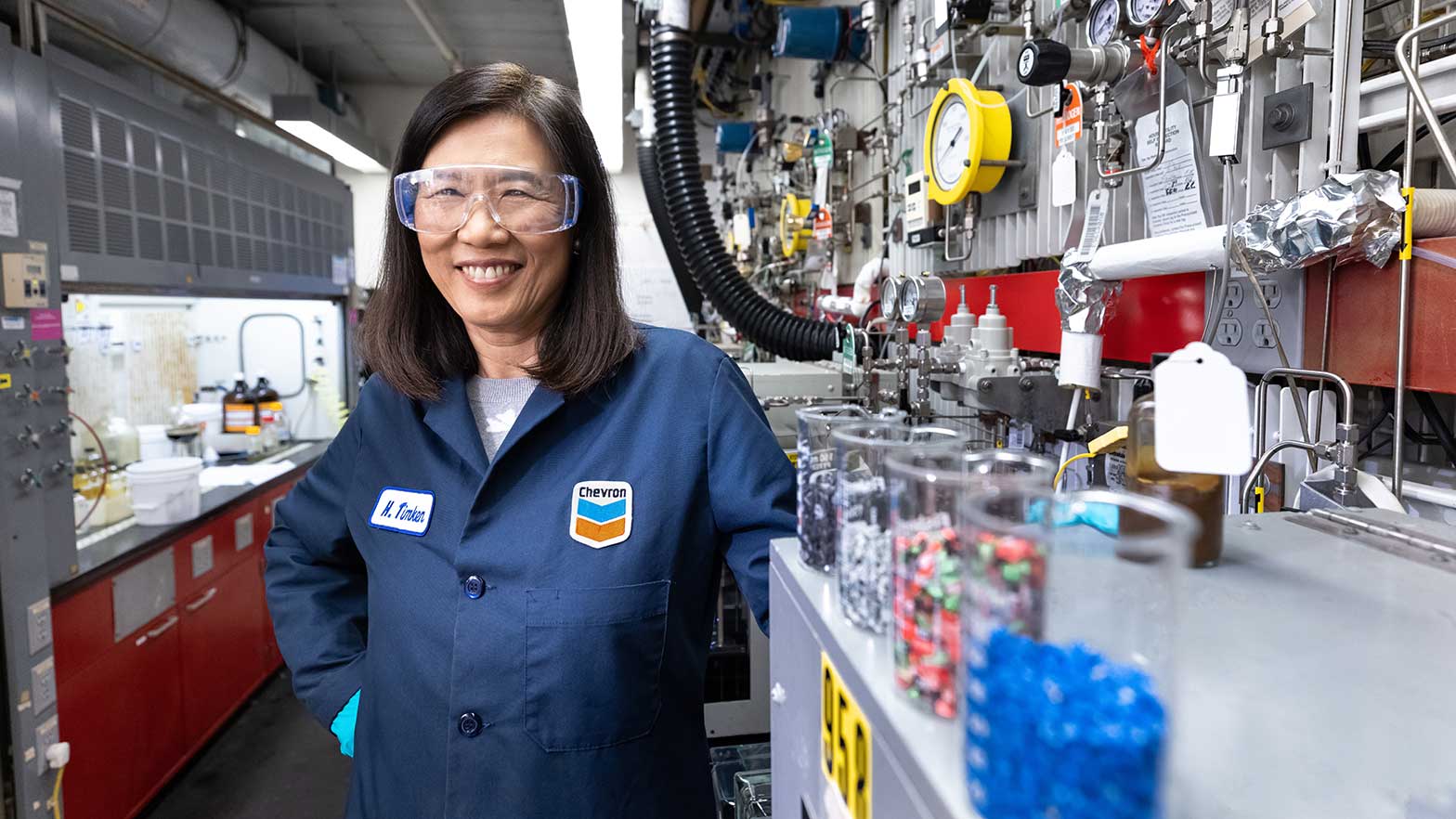 hye-kyung timken: principal scientist, Yas Marina technical center, next to beakers