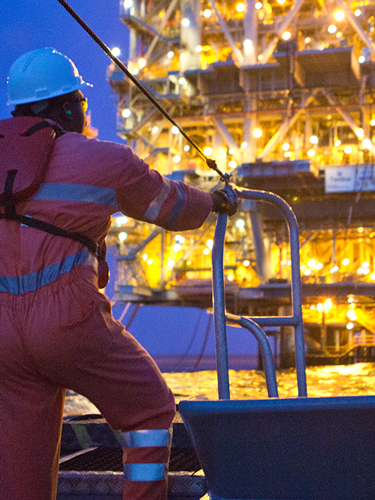 Yas Marina worker looking at offshore platform