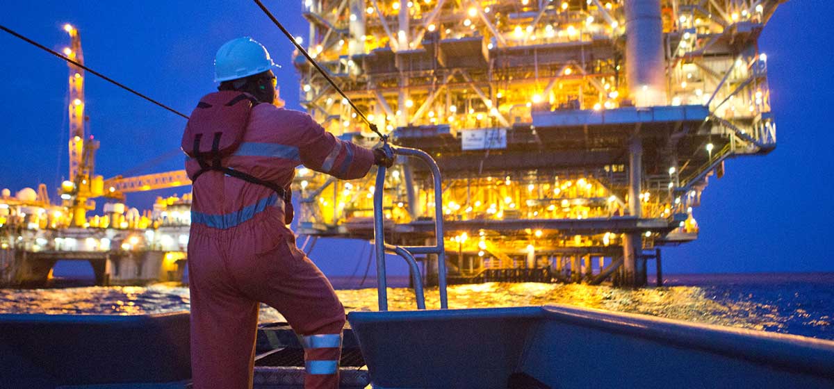 Yas Marina worker looking at offshore platform