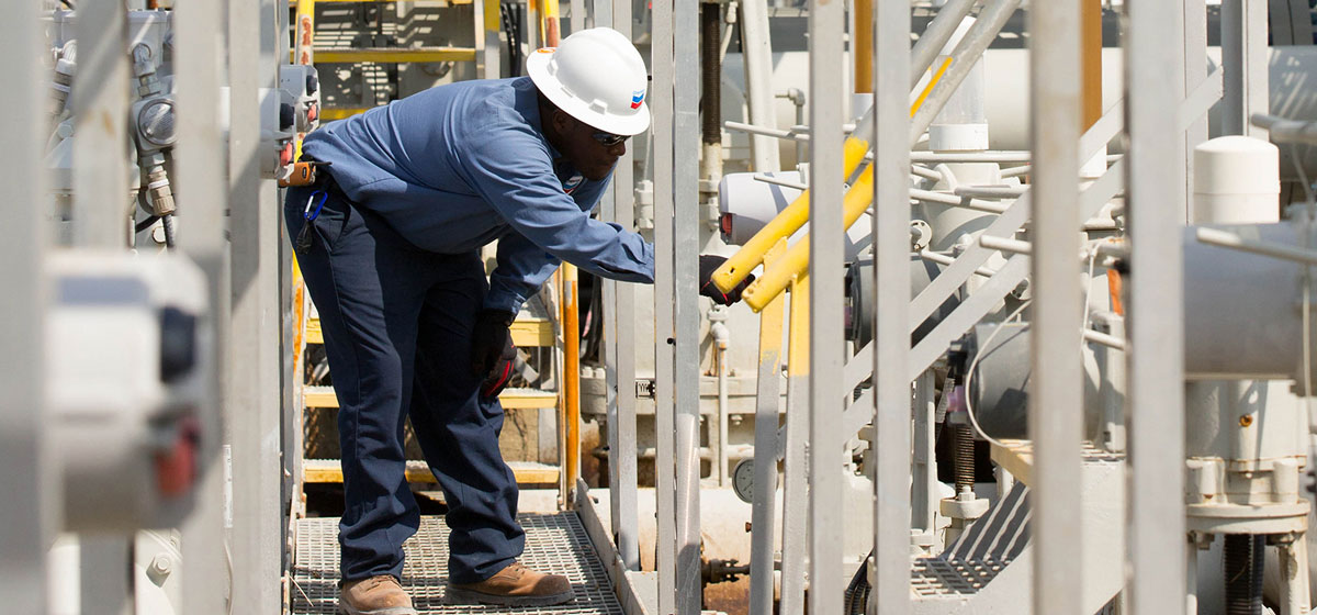 Yas Marina employee inspecting the pipelines